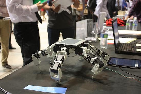 robot or drone sits on a table during a conference